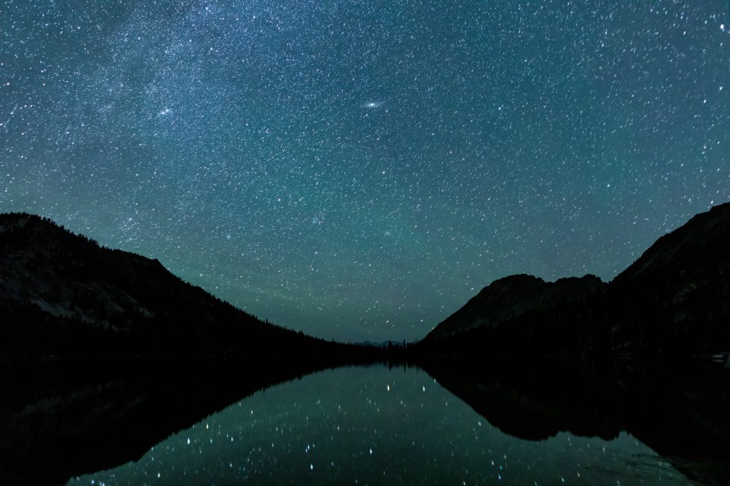 Star-filled night sky over mountains in the central Idaho Dark Sky Reserve.
